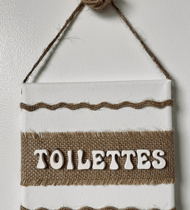 Plaque de porte toilettes